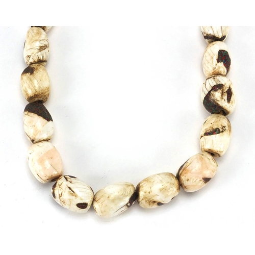 483 - Tribal interest shell necklace