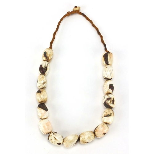 483 - Tribal interest shell necklace