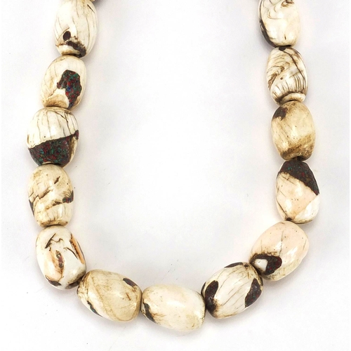 483 - Tribal interest shell necklace