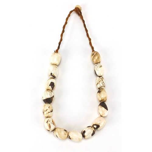 483 - Tribal interest shell necklace