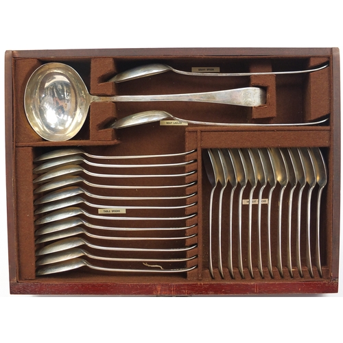 635 - 1920s mahogany canteen of predominantly silver cutlery, the canteen containing twelve silver dinner ... 