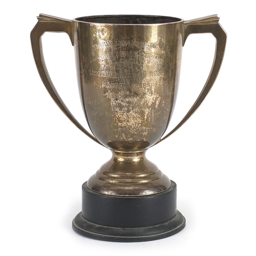 637 - Large silver two handled trophy engraved 'The William Simmonds Challenge Cup awarded by The Luton Du... 