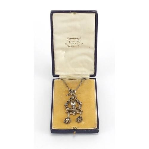 766 - Antique silver and paste pendant on chain, housed in an Emanuel goldsmith and diamond merchant South... 