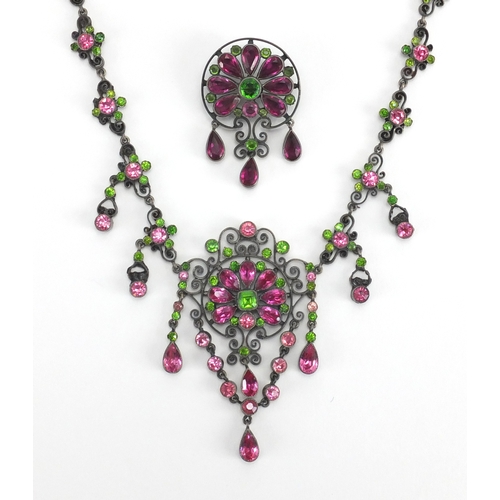 679 - 800 grade silver suffragette necklace and brooch set with pink and green stones, housed in a Hamilto... 