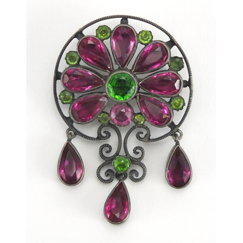 679 - 800 grade silver suffragette necklace and brooch set with pink and green stones, housed in a Hamilto... 