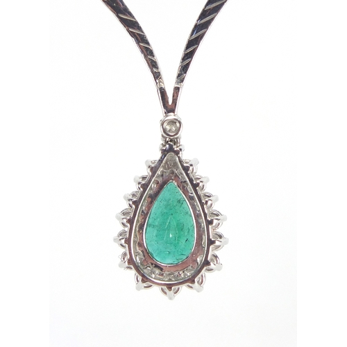 681 - 18ct white gold tear drop Emerald and Diamond necklace, 40cm in length, approximate weight 21.6g