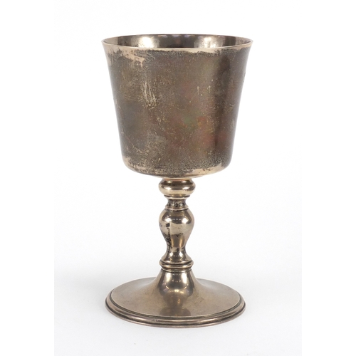 652 - Silver goblet with presentation inscription to the base, hallmarked London 1972, 16cm high, approxim... 