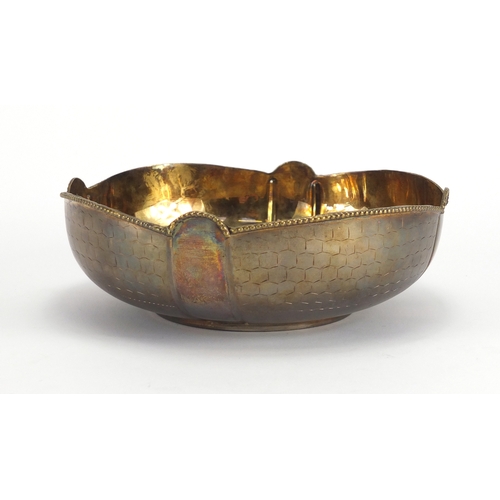 656 - Stylised circular silver bowl with gilt interior, stamped A.SILVER to the base, 20cm in diameter, ap... 