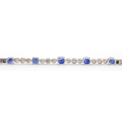 676 - 18ct white gold graduated Sapphire and Diamond bracelet, 18cm in length, approximate weight 13.9g