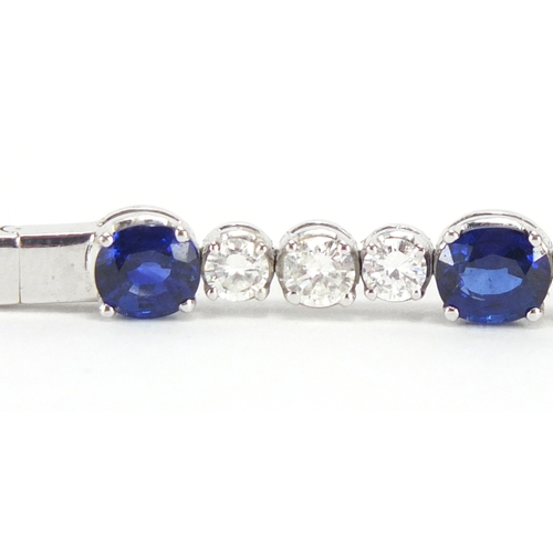 676 - 18ct white gold graduated Sapphire and Diamond bracelet, 18cm in length, approximate weight 13.9g