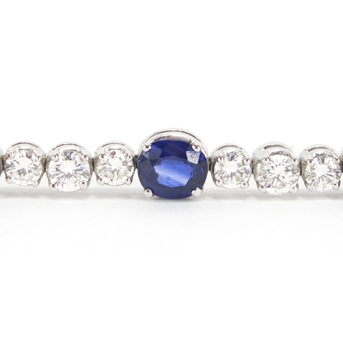 676 - 18ct white gold graduated Sapphire and Diamond bracelet, 18cm in length, approximate weight 13.9g