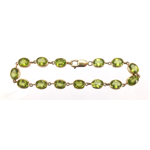 710 - 9ct gold Peridot bracelet, 18cm in length, approximate weight 13.5g