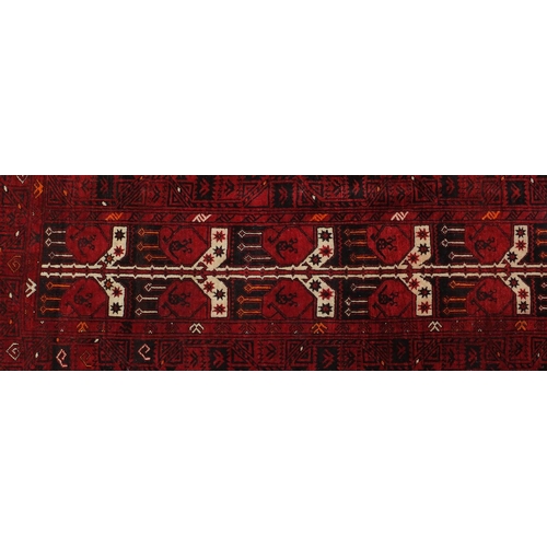 2053 - Rectangular Afghan rug with repeat design, approximately 215cm x 130cm