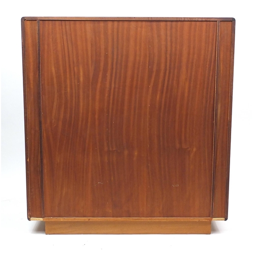 2002 - Danish rosewood compactum by Dyrlund, fitted with two Tambour doors and an arrangement of drawers an... 