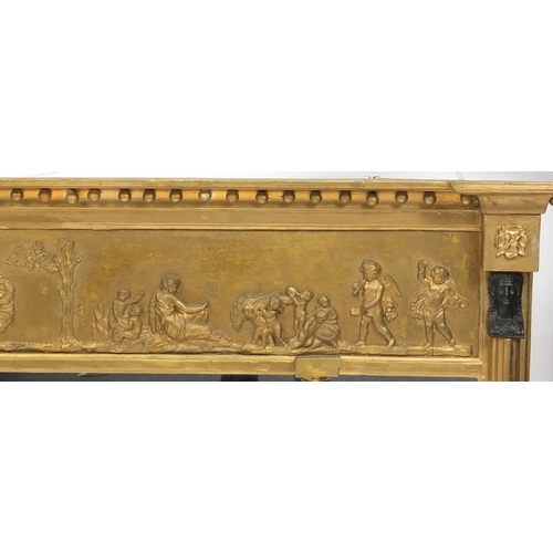 2023 - Gilt framed three panel over mantel mirror, decorated in relief with classical scenes, 100cm high x ... 