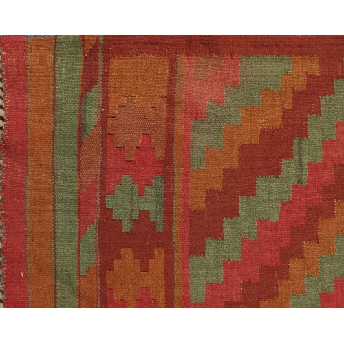 2042 - Rectangular Turkish Kilim carpet runner having an all over geometric diamond design, 390cm x 78cm