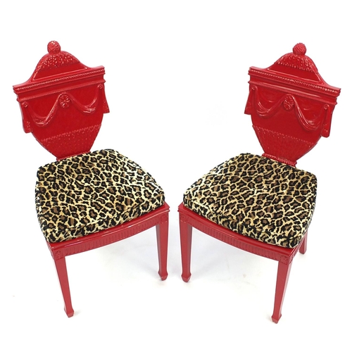 2027 - Pair of decorative red lacquered occasional chairs, in the Adam's style with leopard pattern upholst... 