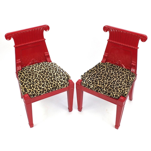 2057 - Pair of Empire influenced red lacquered occasional chairs, with leopard pattern upholstered cushion ... 