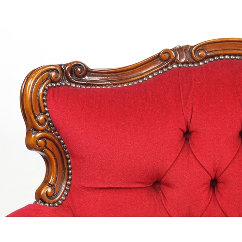 2058 - Decorative ornate carved walnut three seater settee, 98cm H x 190cm W x 66cm D
