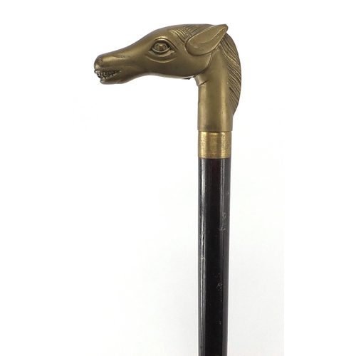 512 - Ebonised walking cane with drinking vessel and brass horse head handle