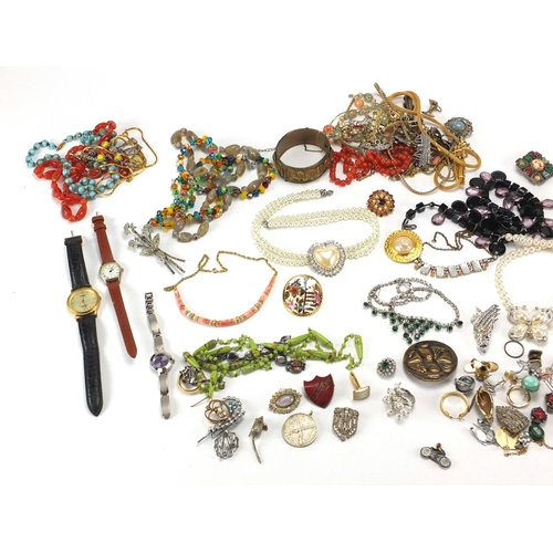 394 - Box of assorted costume jewellery including necklaces, brooches, bracelets etc