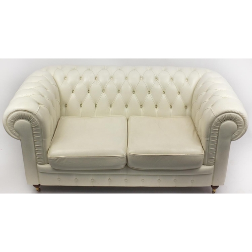 24 - Cream leather Chesterfield settee, 170cm in length