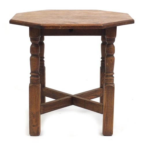 163 - Octagonal oak occasional tale, 51cm high x 54cm in diameter