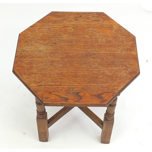 163 - Octagonal oak occasional tale, 51cm high x 54cm in diameter