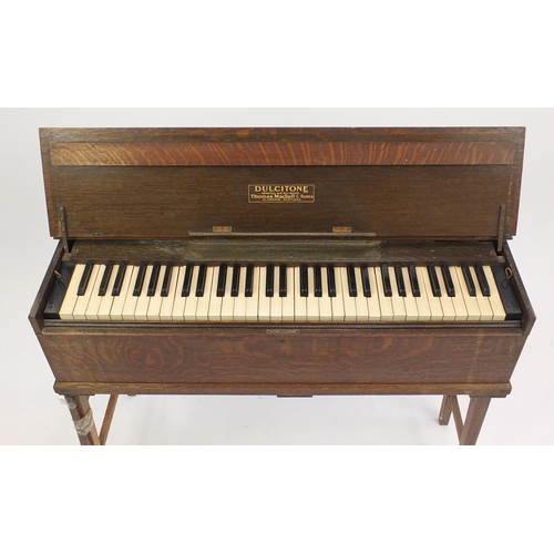 146 - Edwardian oak Dulcitone organ retailed by Thomas Machell & Sons Glasgow, numbered 1577,  79cm H x 95... 