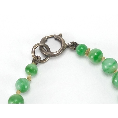 350 - Oriental green jade bead necklace, 44cm in length, approximate weight 37.8g