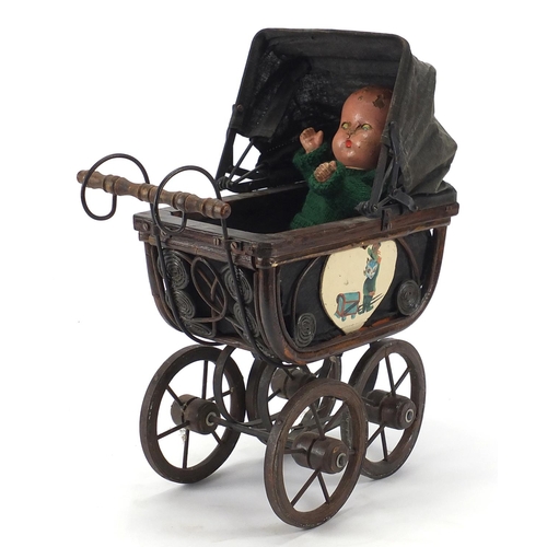 186 - Model of a vintage dolls pram, 38cm high