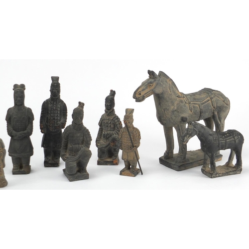 646 - Group of Chinese terracotta figures, the largest 26cm high