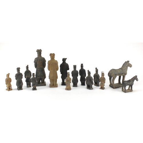 646 - Group of Chinese terracotta figures, the largest 26cm high