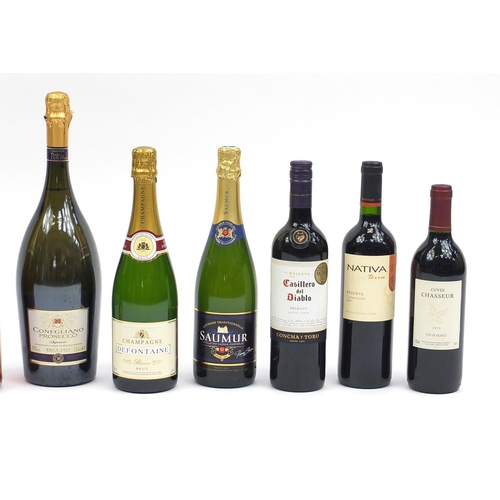 500 - Eleven bottles of alcohol including 1.5L Conegliano Prosecco and red wines