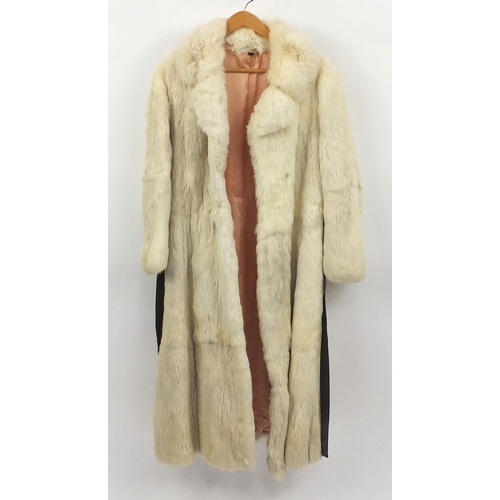 592 - Ladies cream fur coat and brown fur jacket