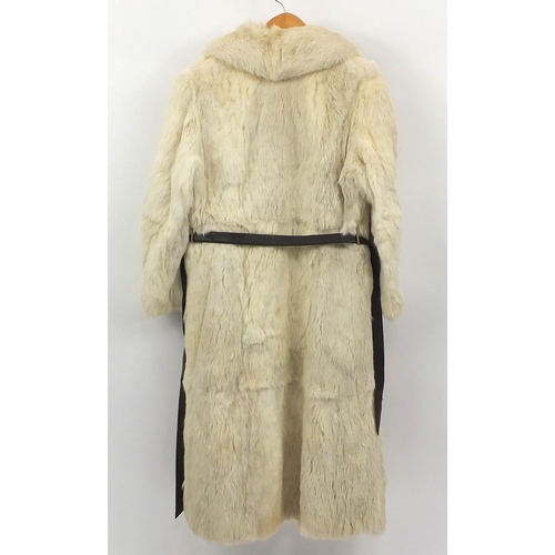 592 - Ladies cream fur coat and brown fur jacket