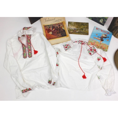 601 - Box of items including a Middle Eastern brass tray, German Military book, poster and a wooden jigsaw... 