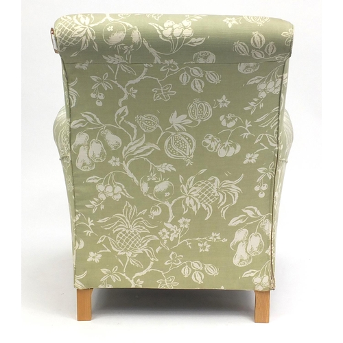 63 - Two seater settee and armchair with green fruit upholstery