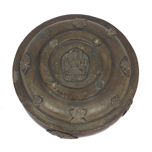 484 - Chinese bronzed metal bowl and cover, decorated in relief with figures, 15cm high x 22cm in diameter