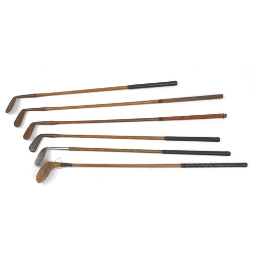 642 - Group of vintage wooden shafted golf clubs