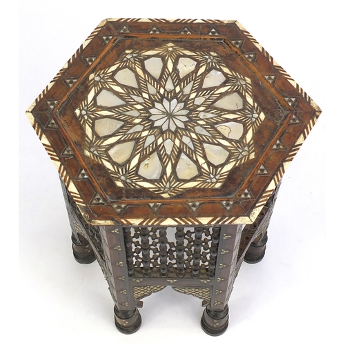 113 - Moorish hexagonal occasional table with Mother of Pearl and bone inlay, 56cm high