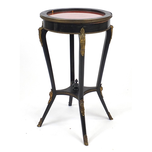 5 - French design ebonised bijouterie table with brass mounts, 78cm high x 46cm in diameter