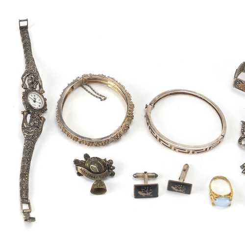 377 - Silver and white metal jewellery including a Marcasite Puma wristwatch, Marcasite brooches and brace... 