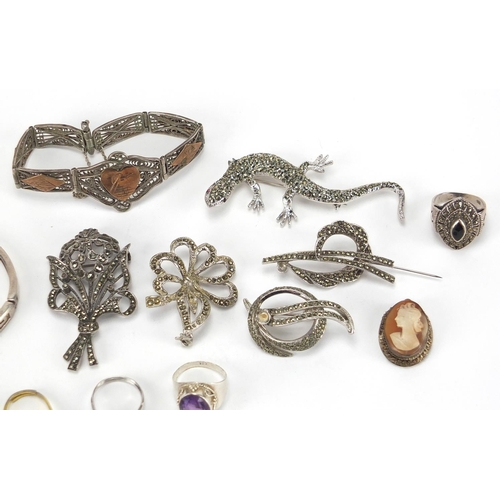 377 - Silver and white metal jewellery including a Marcasite Puma wristwatch, Marcasite brooches and brace... 