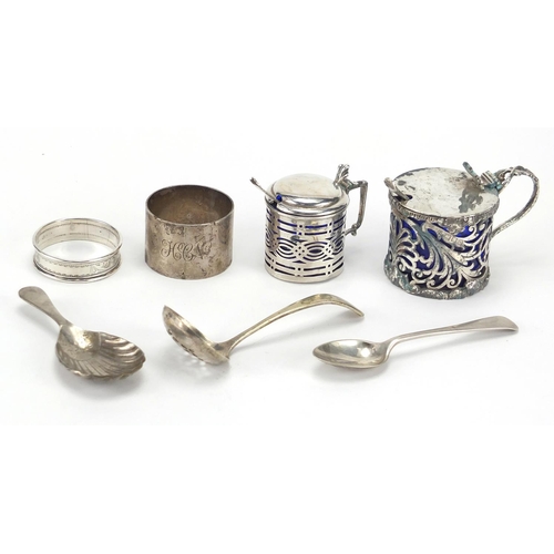 539 - Silver and white metal items including a silver mustard with blue glass liner and napkin rings