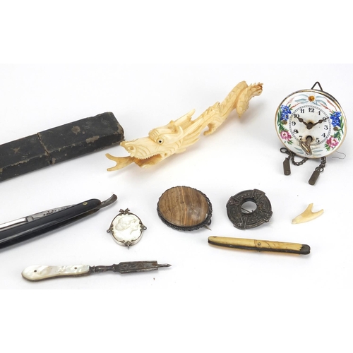 548 - Bag of objects including a Wintermantel clock with enamel dial, Mother of Pearl cameo brooch and cut... 