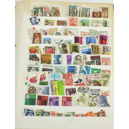 694 - British stamps arranged in an album and stock book, some mint unused