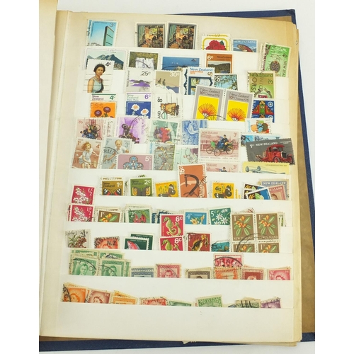 694 - British stamps arranged in an album and stock book, some mint unused