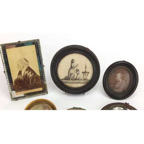 544 - Three portrait miniatures, one with a mirrored cur glass framed, and a miniature convex mirror, the ... 