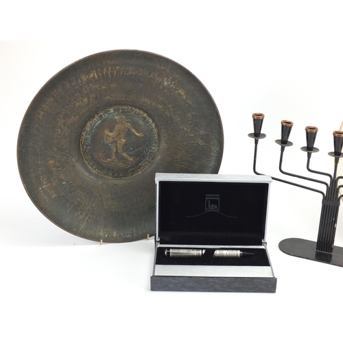 583 - Jewish items including a bronzed metal charger, boxed pen and a candelabra